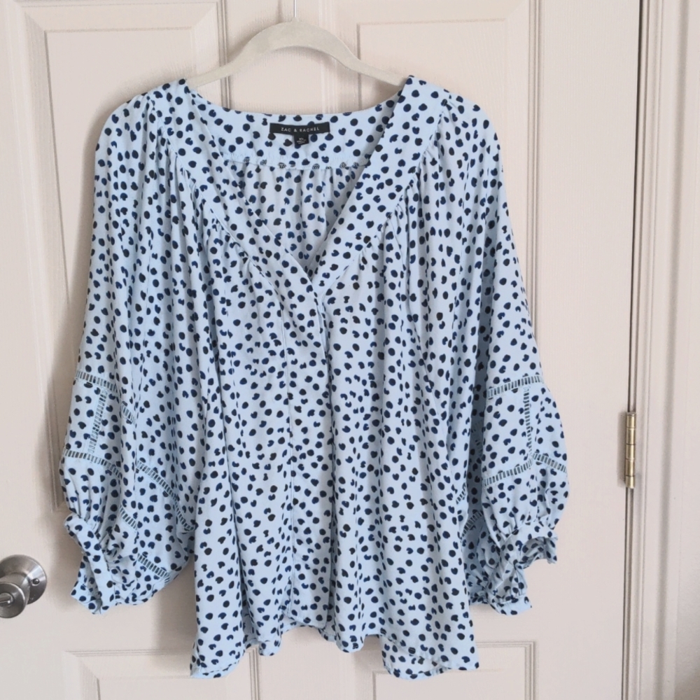Front, hidden button v-neck blouse